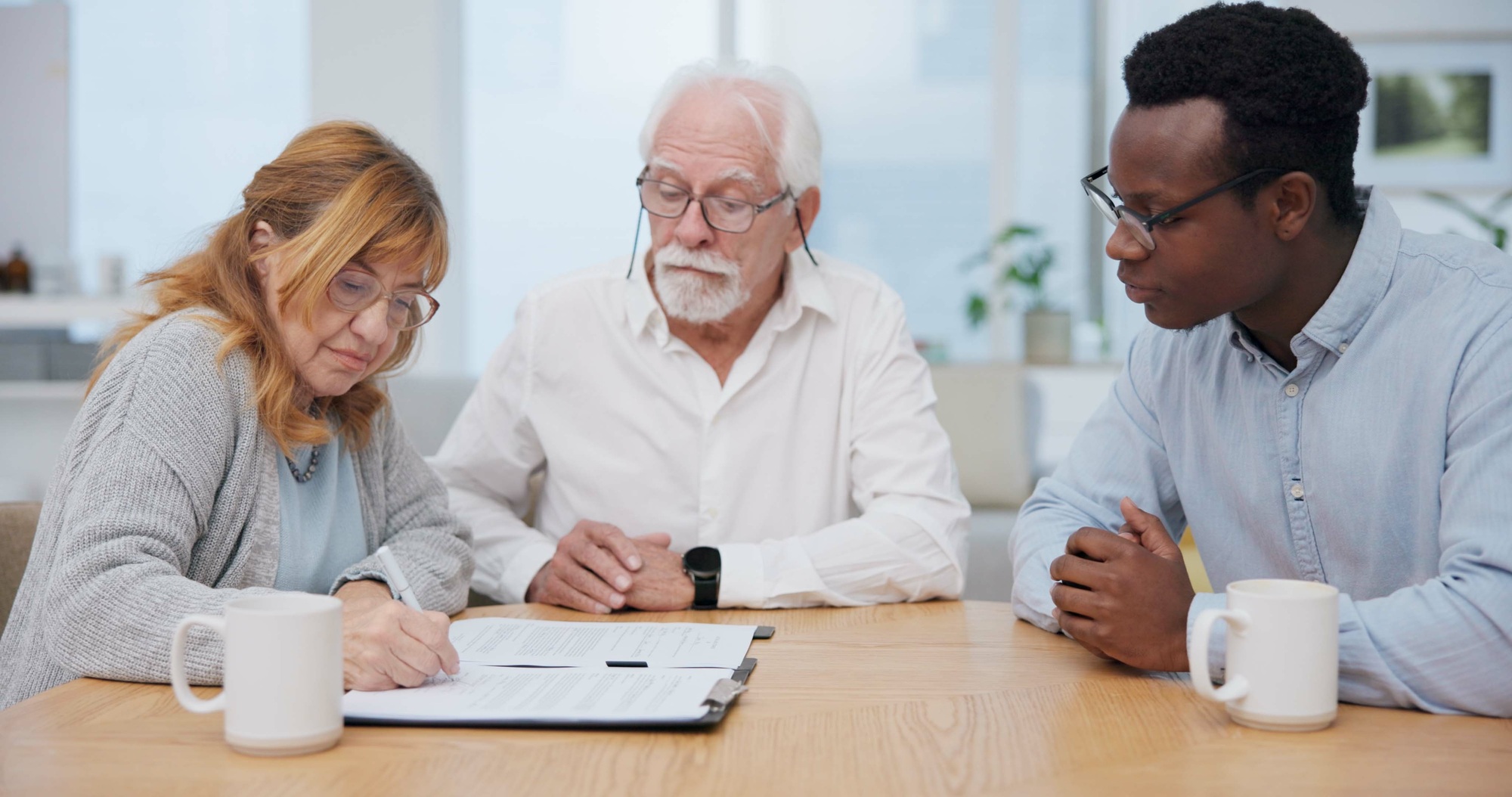 Senior couple, insurance and contract with financial advisor and retirement plan to sign. Document,