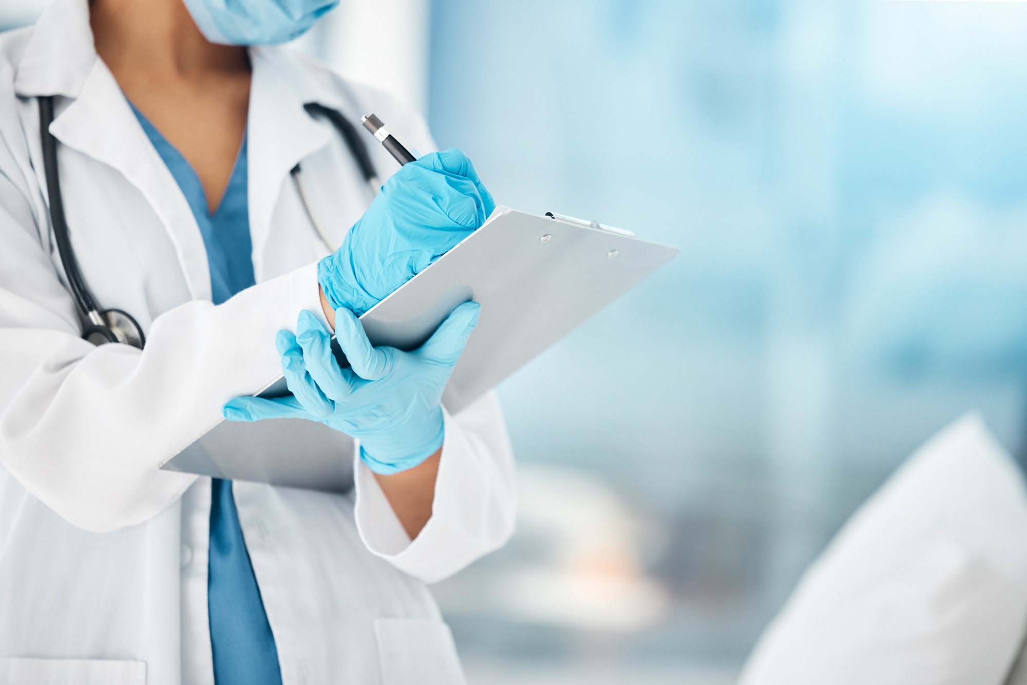 Woman, hands or doctor clipboard writing in hospital for life insurance test results, medical healt