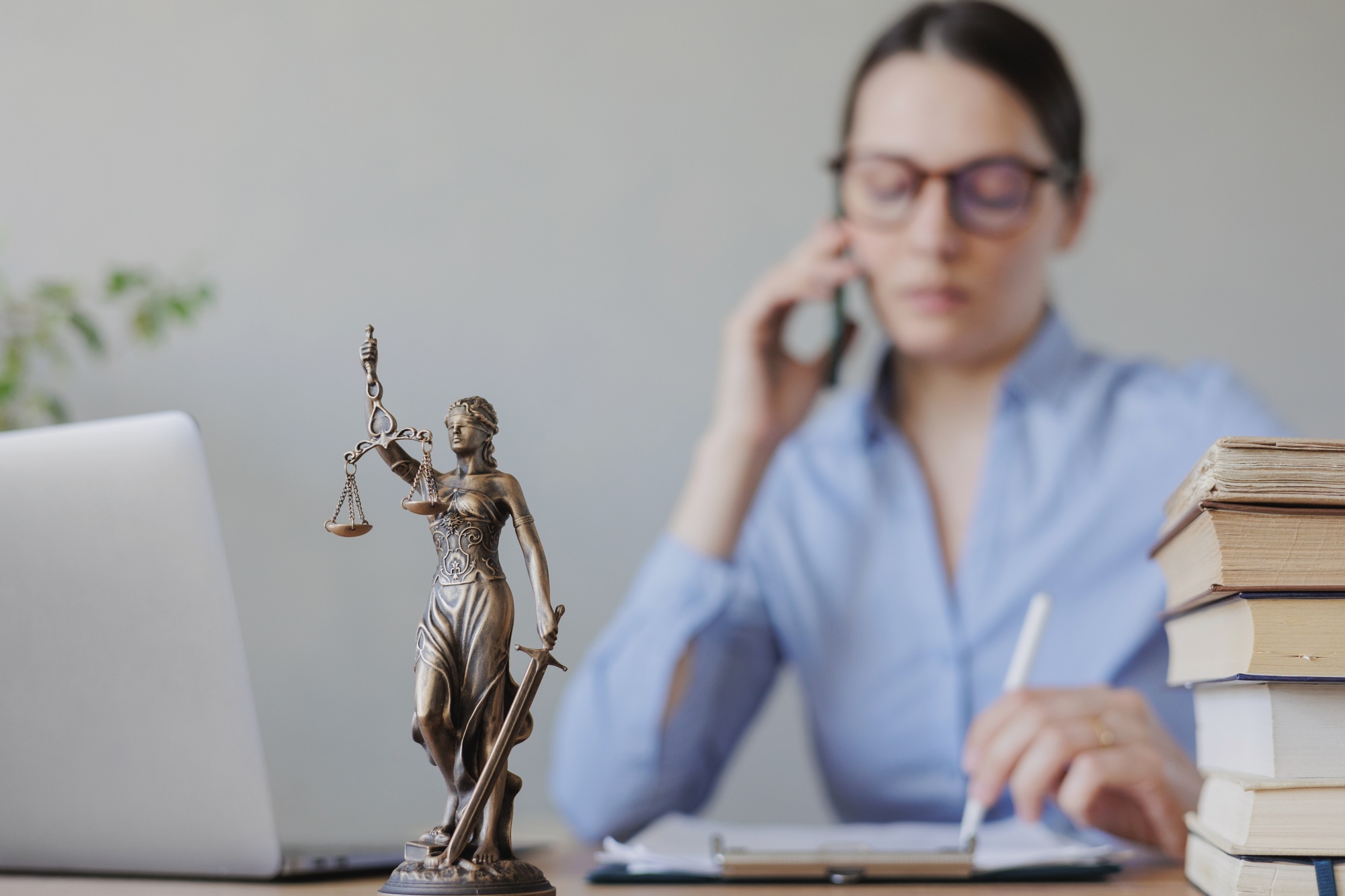 work in a law firm that advises online during the period of self-isolation. a beautiful woman is a